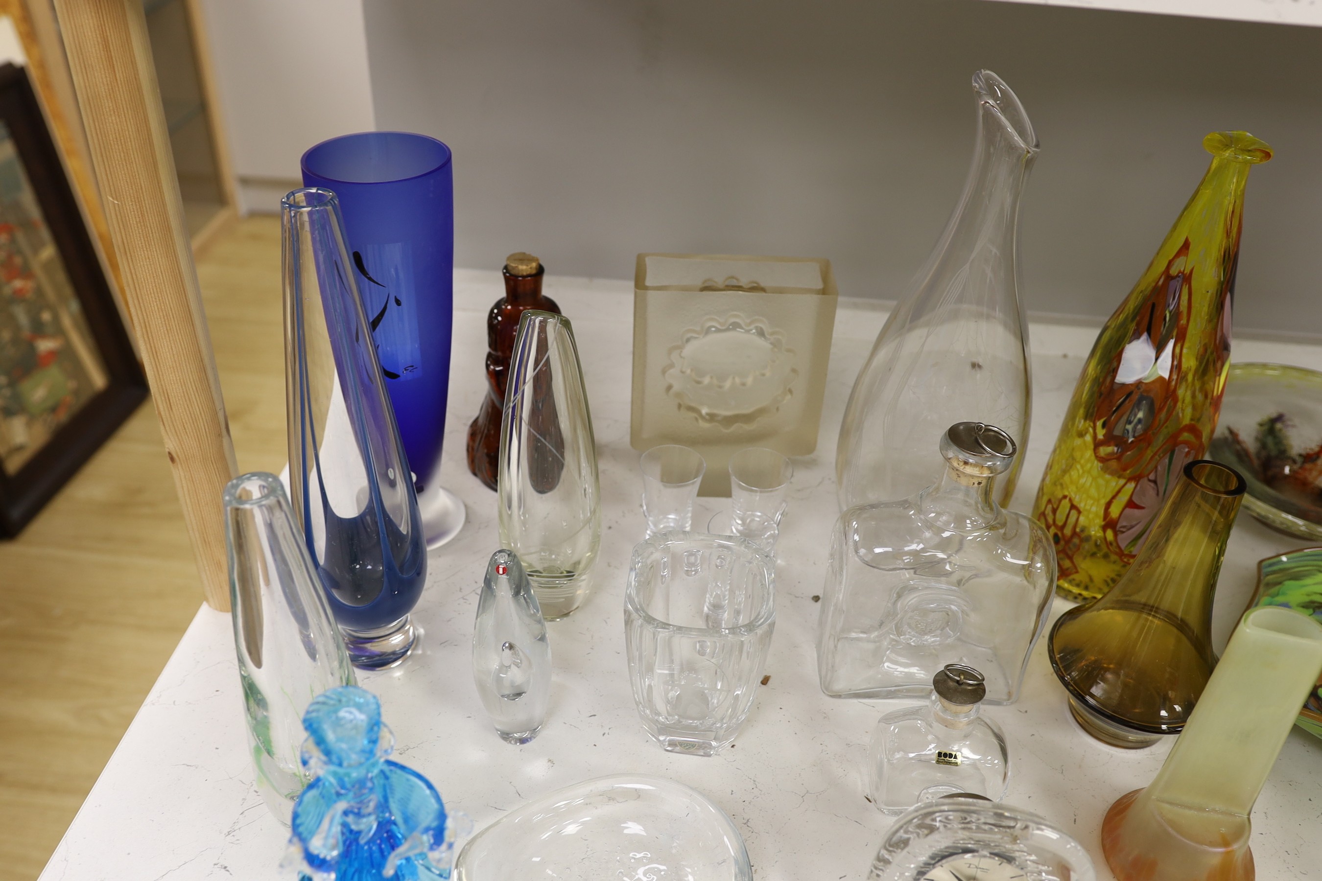 A collection of assorted Scandinavian glassware including Kosta, Erik Hoglund for Boda and Tapio Wirkkala, tallest 58cm